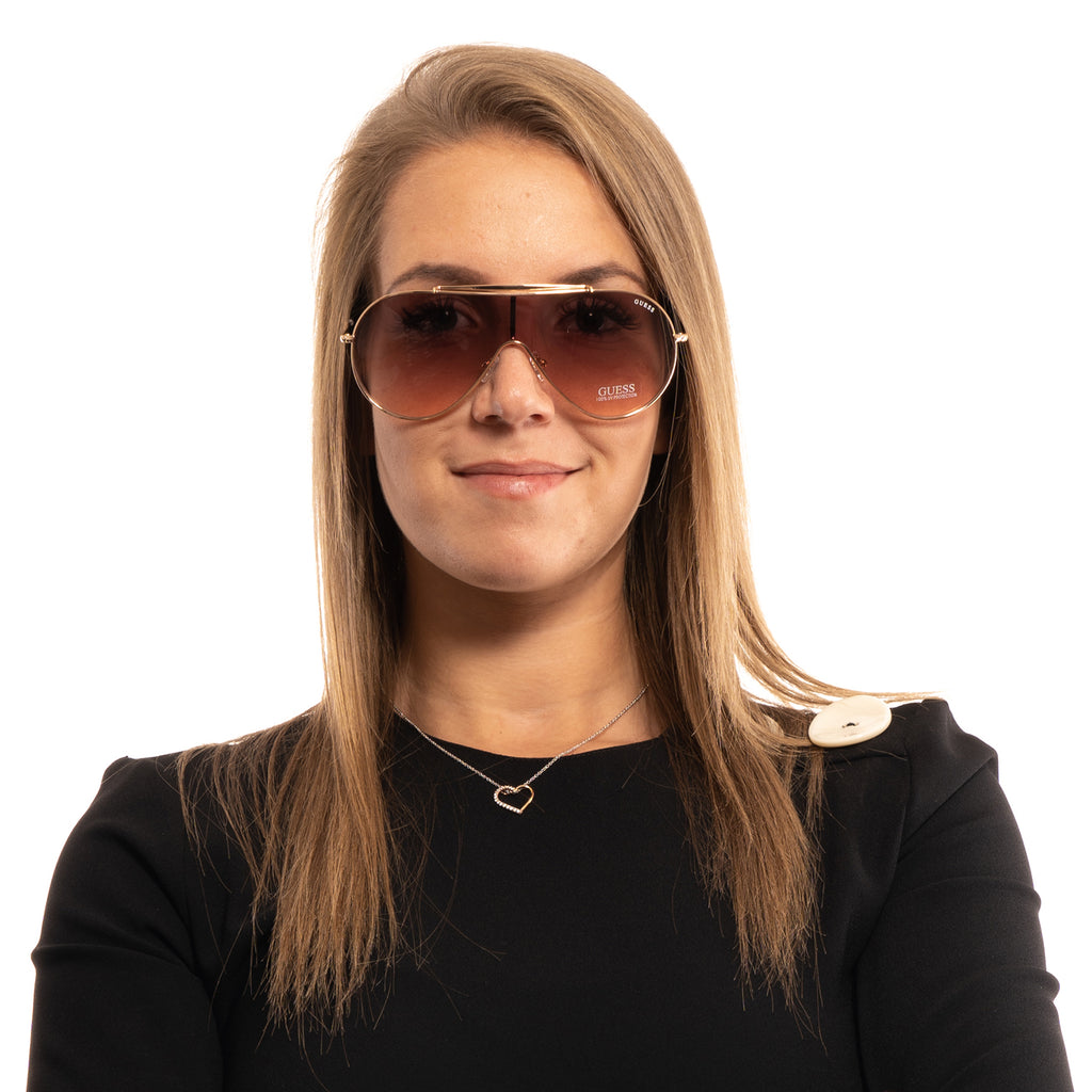 Guess sunglasses in Gold and Pink with Metal frame, model Guess Sunglasses GF0370 0032T, from Burghley & Co – Luxury eyewear UK